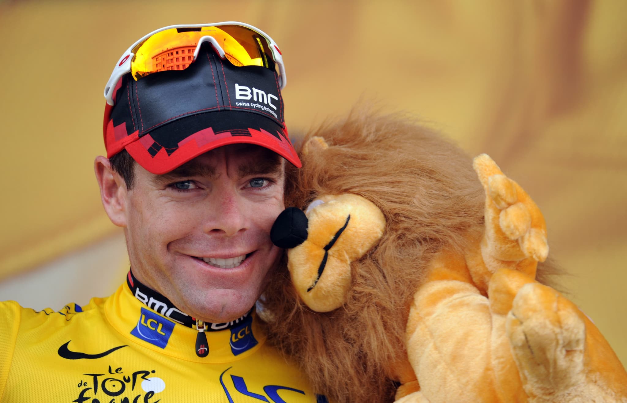 Cadel Evans in Yellow coming into Paris, now Mummu Cycling partner